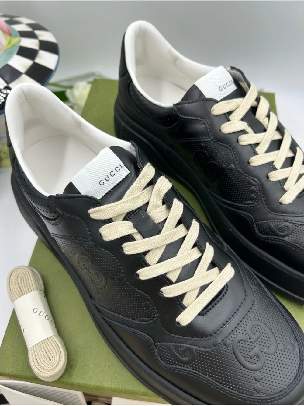 Men’s Gucci GG embossed black leather sneakers size 10 fits 10.5 US made Italy